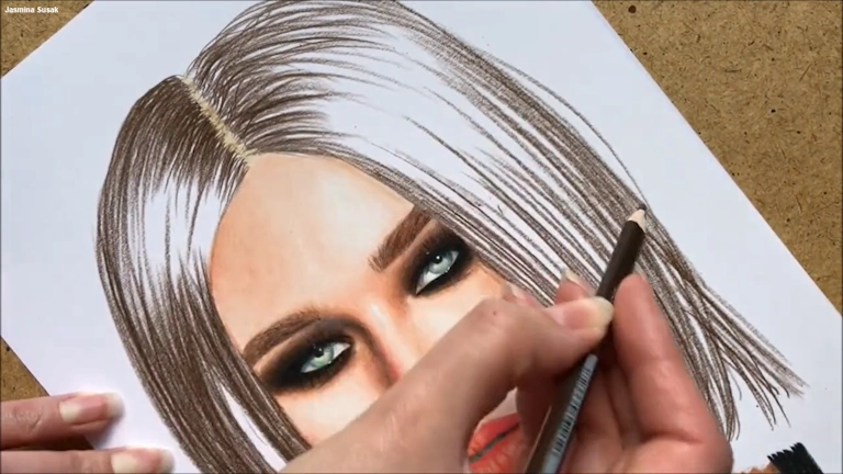 Drawing realistic hair strands with colored pencils
Blending strokes for lifelike hair in a portrait